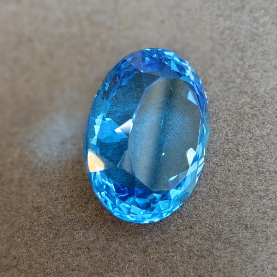 Swiss Blue Topaz, Oval Faceted, 34.76 ct — AIG Certified