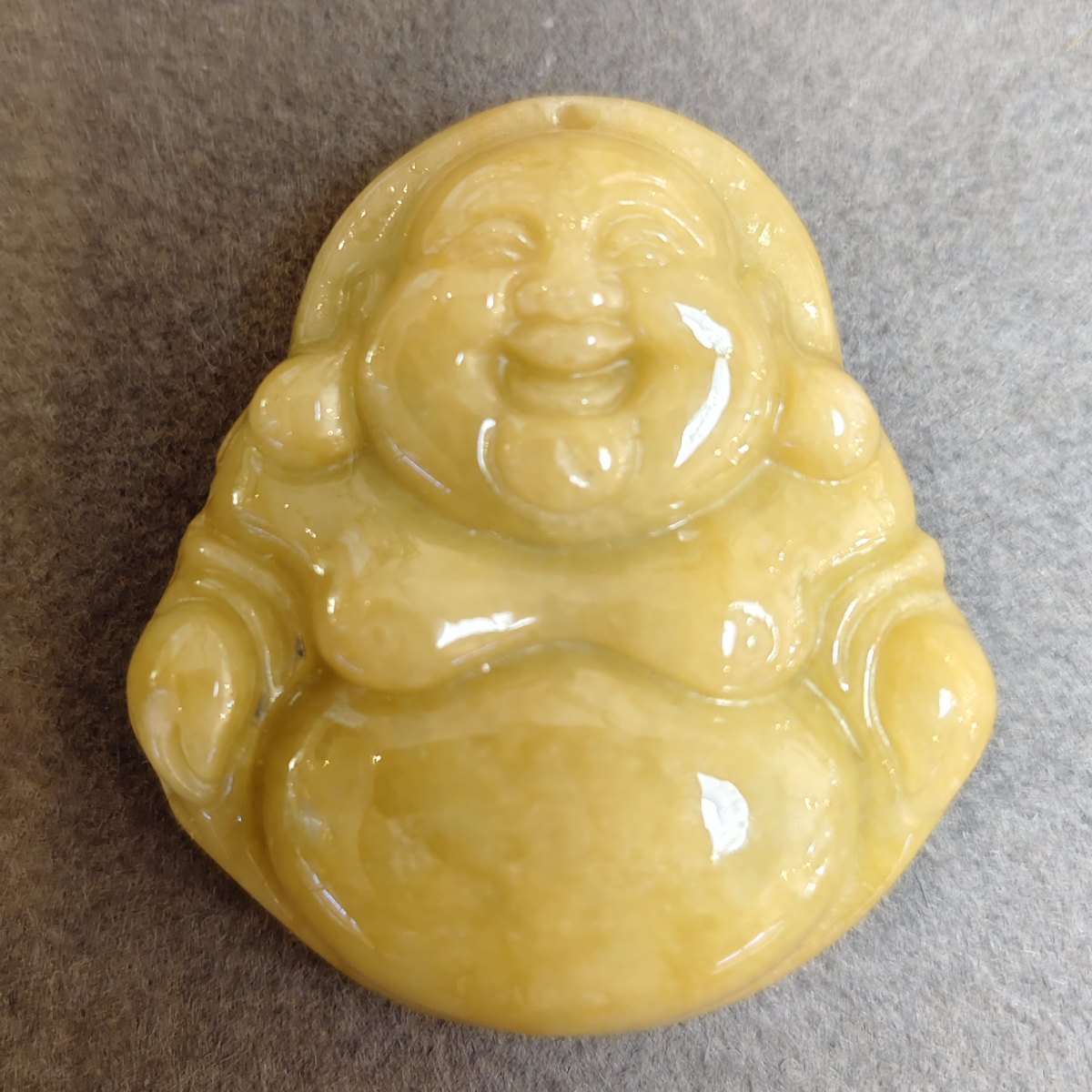 Yellow Jadeite Laughing Buddha, Type A, 149.29 ct — AIG Certified